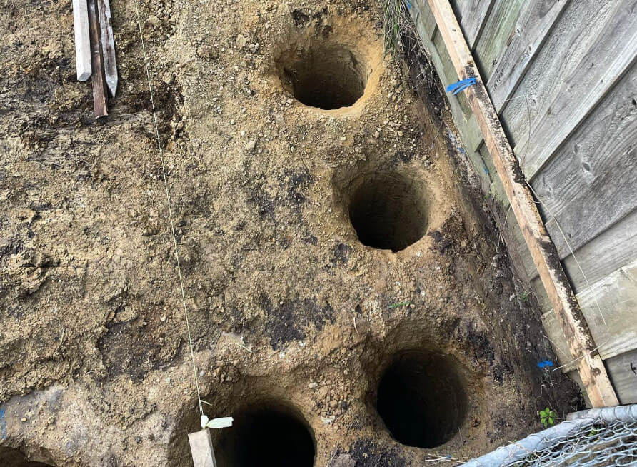 4 Holes dug for house footings or piers