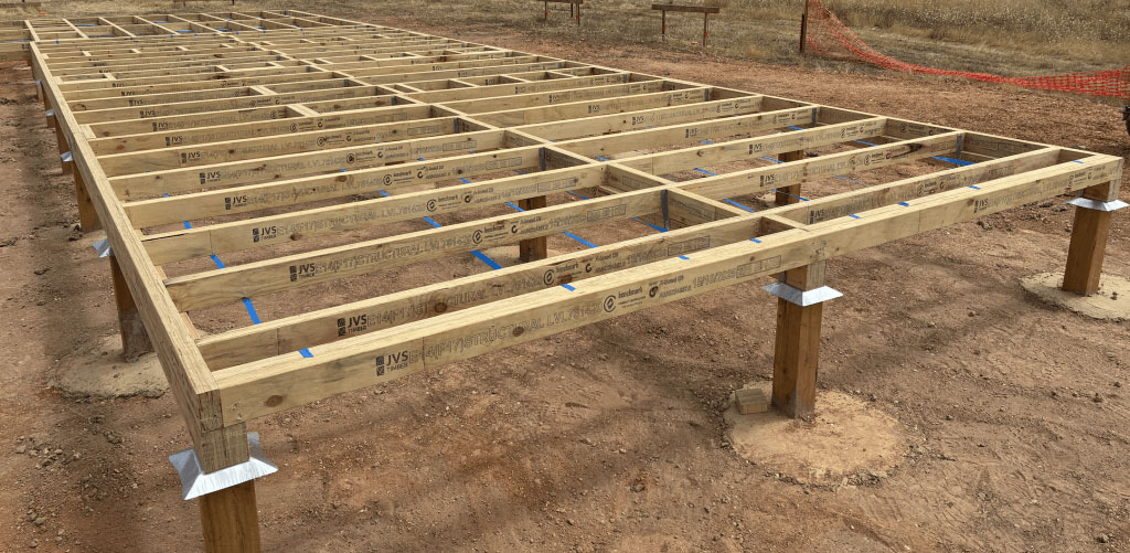 Initial wooden floor framing stage of construction